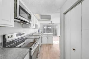 5212 CYPRESS CREEK DRIVE, ORLANDO, FL 32811 Sold 04/19/24
