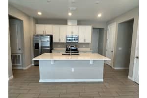 895 BLUE CREEK DRIVE, HAINES CITY, FL 33844 - MLS#MFRO6303403