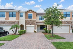 1833 PORTOFINO MEADOWS BOULEVARD, ORLANDO, FL 32824 - MLS#MFRO6322478