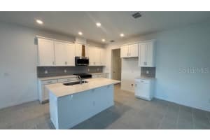 404 OAK FLAT ALLEY, GROVELAND, FL 34736 - MLS#MFRO6322679