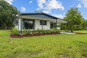 403 CLEARWATER AVENUE, POLK CITY, FL 33868 - MLS#MFRO6323211