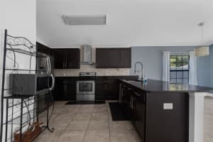 305 CHELMSFORD CT, KISSIMMEE, FL 34758 - MLS#MFRO6324701