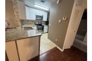 7618 PISSARRO DRIVE, ORLANDO, FL 32819 - MLS#MFRO6329726