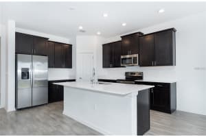 7137 DILLY LAKE AVENUE, GROVELAND, FL 34736 - MLS#MFRO6330595
