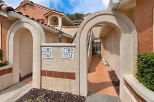 7711 SUGAR BEND DRIVE, ORLANDO, FL 32819 - MLS#MFRO6337973