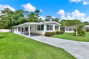 934 BLUE HERON BOULEVARD, OSTEEN, FL 32764 - MLS#MFRO6342107