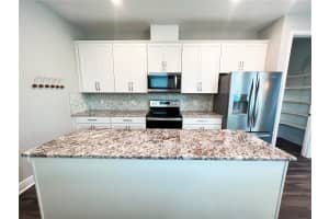 7037 CARRICKBEND LANE, ORLANDO, FL 32819 - MLS#MFRO6342211