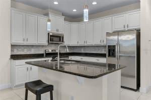 2504 SAPPHIRE GREENS LANE, SUN CITY CENTER, FL 33573 - MLS#MFRO6342902