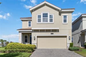 8833 BETHPAGE LANE, CHAMPIONS GATE, FL 33896 - MLS#MFRO6349323
