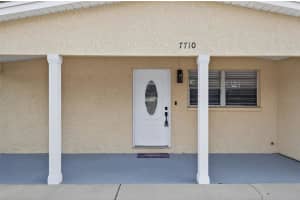 7710 BROOKSIDE LANE, TAMPA, FL 33615 - MLS#MFRO6353131