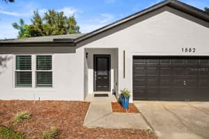 1552 WHOOPING DRIVE, GROVELAND, FL 34736 - MLS#MFRO6360847