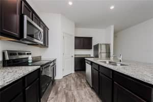 126 HIDDEN LAKE LOOP, HAINES CITY, FL 33844 - MLS#MFRO6361223