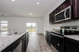 126 HIDDEN LAKE LOOP, HAINES CITY, FL 33844 - MLS#MFRO6361223