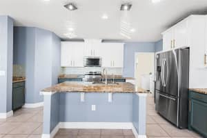 1848 OAK HAMMOCK COURT, LUTZ, FL 33558 - MLS#MFRO6363388