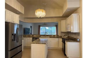 54 CAMINO REAL BOULEVARD, HOWEY IN THE HILLS, FL 34737 - MLS#MFRO6364917