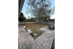 7702 LEGACY LANE, ORLANDO, FL 32818 - MLS#MFRO6370165