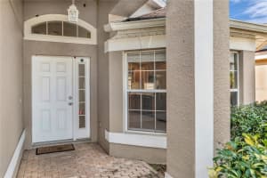 8411 PORT LANCASHIRE DRIVE, ORLANDO, FL 32829 - MLS#MFRO6377059