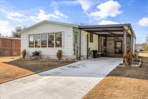 1020 DUSTIN DRIVE, LADY LAKE, FL 32159 - MLS#MFRO6382426