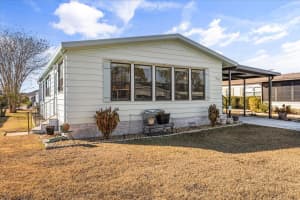 1020 DUSTIN DRIVE, LADY LAKE, FL 32159 - MLS#MFRO6382426