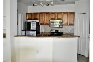 6157 METROWEST BOULEVARD, ORLANDO, FL 32835 - MLS#MFRO6387525