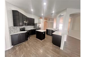 3930 LAKESIDE RESERVE LANE, ORLANDO, FL 32810 - MLS#MFRO6388015