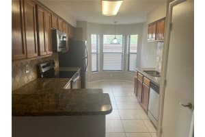 7865 SUGAR BEND DRIVE, ORLANDO, FL 32819 - MLS#MFRO6388161