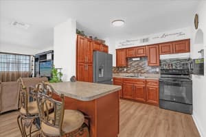 7304 POMELO DRIVE, ORLANDO, FL 32819 - MLS#MFRO6391936