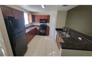 6054 GIBSON AVENUE, TAMPA, FL 33617 - MLS#MFRO6393678