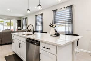 891 BLUE CREEK DRIVE, HAINES CITY, FL 33844 - MLS#MFRO6393764