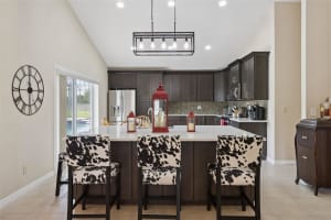 7833 GOLF PARADISE WAY, CLERMONT, FL 34711 - MLS#MFRO6396447