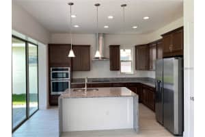 8112 MABURY LANE, ORLANDO, FL 32832 - MLS#MFRO6400657