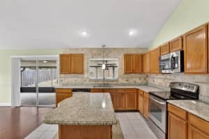 7636 DUNDAS DRIVE, ORLANDO, FL 32818 - MLS#MFRO6402117