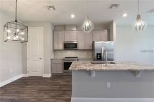 7055 CARRICKBEND LANE, ORLANDO, FL 32819 - MLS#MFRO6403728