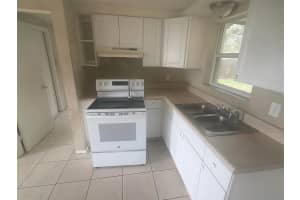1302 58TH STREET, TAMPA, FL 33619 - MLS#MFRO6412416