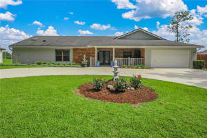 7243 WOODVILLE CRESCENT, ORLANDO, FL 32819 - MLS#MFRO6413809