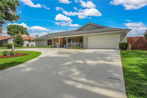 7243 WOODVILLE CRESCENT, ORLANDO, FL 32819 - MLS#MFRO6413809