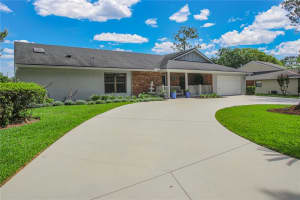7243 WOODVILLE CRESCENT, ORLANDO, FL 32819 - MLS#MFRO6413809
