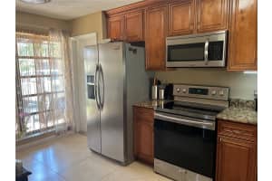 6049 AMBERTREE LN, GREENACRES, FL 33463 Sold 11/22/22