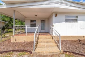 31 WOODLAND CIRCLE, HAINES CITY, FL 33844 - MLS#MFRP4938645