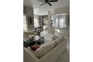7609 BAY PORT ROAD, ORLANDO, FL 32819 Sold 06/05/24