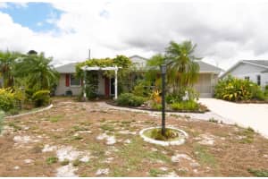 1409 FOX HILLS DRIVE, SUN CITY CENTER, FL 33573 Sold 09/23/24