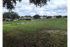 1911 ACADIA GREENS DRIVE, SUN CITY CENTER, FL 33573 Sold 12/30/24