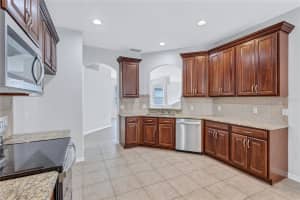 7806 GRASMERE DRIVE, LAND O LAKES, FL 34637 - MLS#MFRTB8303639