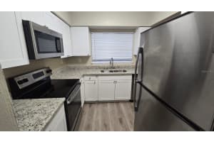 611 PINEWOOD DRIVE, DUNEDIN, FL 34698 Sold 04/25/25