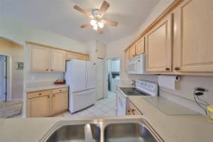 2112 ACADIA GREENS DRIVE, SUN CITY CENTER, FL 33573 - MLS#MFRTB8366068