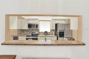 11722 CURRIE LANE, LARGO, FL 33774 Sold 06/05/25