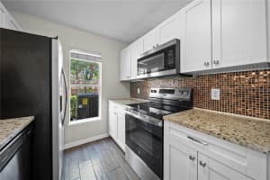 9942 ASHBURN LAKE DRIVE, TAMPA, FL 33610 - MLS#MFRTB8376061