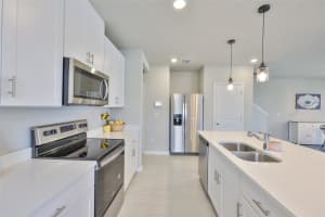 7709 IMAGINATION PLACE, WESLEY CHAPEL, FL 33545 - MLS#MFRTB8386099