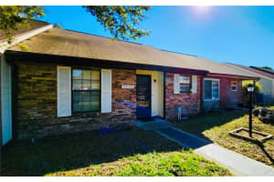 35140 WHISPERING OAKS BOULEVARD, DADE CITY, FL 33523 - MLS#MFRTB8400993