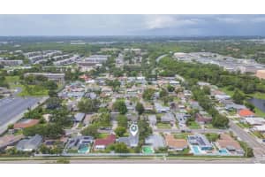 7734 ASHFORD COURT, ST PETERSBURG, FL 33709 - MLS#MFRTB8403376